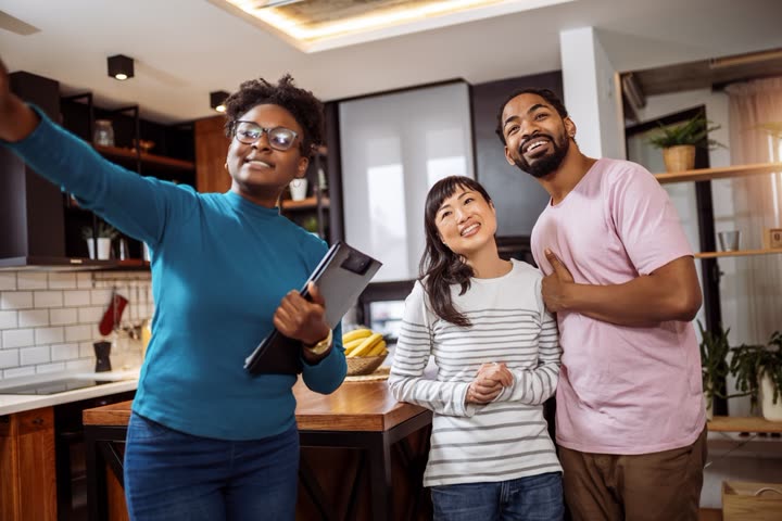 Agent reviewing property listings on tablet